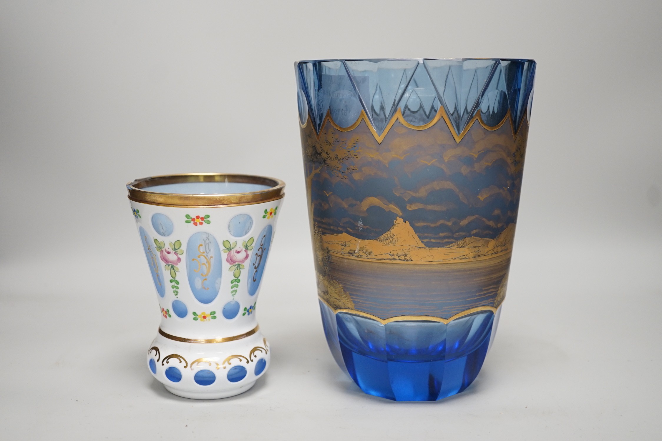 Two Bohemian glass vases, The largest blue glass vase in a mood with a horse and carriage scene, possibly Moser, tallest 21cm